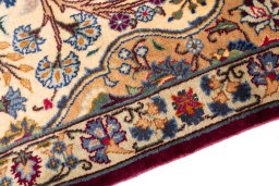 Backside of handmade 2002s Kashmar rug showing knot structure and weave density