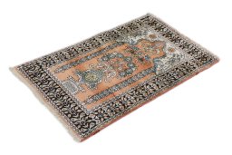 Corner detail of New Kashmar rug showing border pattern and Silk pile