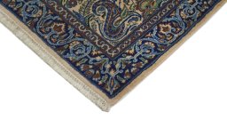 Surface texture of 1960s Kerman rug with natural Wool and intricate pattern