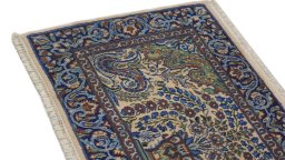 Backside of handmade 1960s Kerman rug showing knot structure and weave density