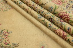 Corner detail of 1960s Kerman rug showing border pattern and Wool pile