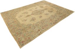 Corner detail of 1960s Kerman rug showing border pattern and Wool pile