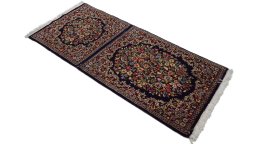 Corner detail of 1970s Kerman rug showing border pattern and Wool pile
