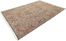 Corner detail of 1970s Kerman rug showing border pattern and Wool pile