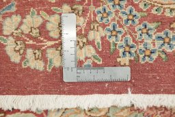 Close-up detail of 1950s Kerman rug from Iran / Persia showing Wool weave