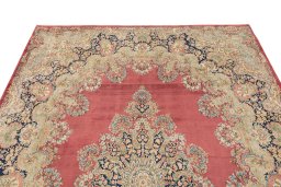 Surface texture of 1950s Kerman rug with natural Wool and intricate pattern