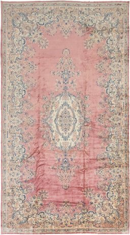 Full view of 1950s Kerman rug from Iran / Persia, 655 × 360 cm in Red tones