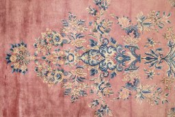 Corner detail of 1950s Kerman rug showing border pattern and Wool pile