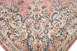 Close-up detail of 1950s Kerman rug from Iran / Persia showing Wool weave