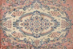 Full view of 1950s Kerman rug from Iran / Persia, 655 × 360 cm in Red tones
