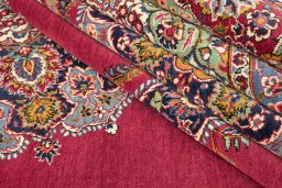 Corner detail of 1950s Kerman rug showing border pattern and Wool pile