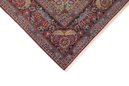 Backside of handmade 1950s Kerman rug showing knot structure and weave density