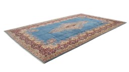 Corner detail of 1960s Kerman rug showing border pattern and Wool pile