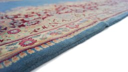 Close-up detail of 1960s Kerman rug from Iran / Persia showing Wool weave