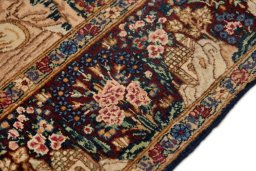 Close-up detail of 1960s Kerman rug from Iran / Persia showing Wool weave