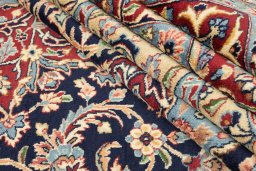 Corner detail of 1960s Kerman rug showing border pattern and Wool pile