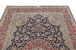 Surface texture of 1960s Kerman rug with natural Wool and intricate pattern
