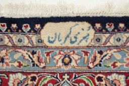 Close-up detail of 1960s Kerman rug from Iran / Persia showing Wool weave