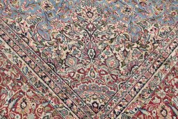 Corner detail of 1960s Kerman rug showing border pattern and Wool pile