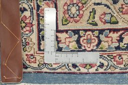 Close-up detail of 1960s Kerman rug from Iran / Persia showing Wool weave
