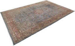 Corner detail of 1960s Kerman rug showing border pattern and Wool pile