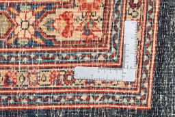 Close-up detail of 1900s Kerman rug from Iran / Persia showing Wool weave