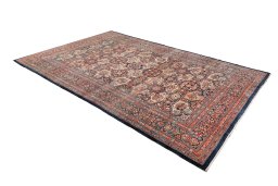 Close-up detail of 1900s Kerman rug from Iran / Persia showing Wool weave