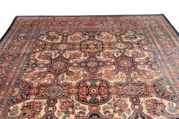 Surface texture of 1900s Kerman rug with natural Wool and intricate pattern