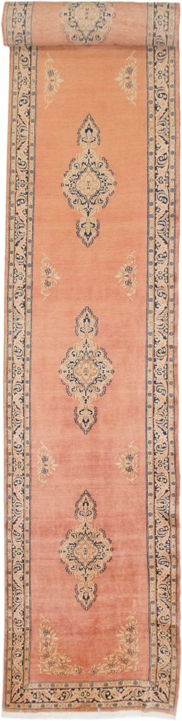 Full view of 1940s Kerman rug from Iran / Persia, 1179 × 109 cm in Terracotta tones