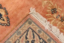 Corner detail of 1940s Kerman rug showing border pattern and Wool pile
