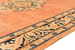Backside of handmade 1940s Kerman rug showing knot structure and weave density