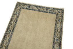 Surface texture of 1930s Kerman rug with natural Wool and intricate pattern