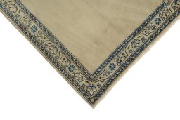 Backside of handmade 1930s Kerman rug showing knot structure and weave density