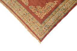 Corner detail of 1950s Kerman rug showing border pattern and Wool pile