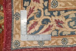 Close-up detail of 1950s Kerman rug from Iran / Persia showing Wool weave