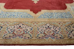Corner detail of 2000s Kerman rug showing border pattern and Wool pile