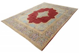 Corner detail of 2000s Kerman rug showing border pattern and Wool pile