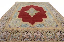 Surface texture of 2000s Kerman rug with natural Wool and intricate pattern