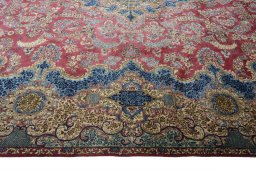 Corner detail of 1930s Kerman rug showing border pattern and Wool pile