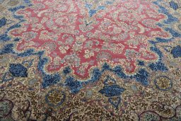 Close-up detail of 1930s Kerman rug from Iran / Persia showing Wool weave