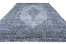Surface texture of 1970s Kerman rug with natural Wool and intricate pattern