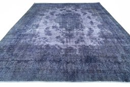Surface texture of 1970s Kerman rug with natural Wool and intricate pattern