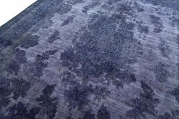 Backside of handmade 1970s Kerman rug showing knot structure and weave density