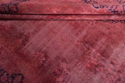 Close-up detail of 1970s Kerman rug from Iran / Persia showing Wool weave