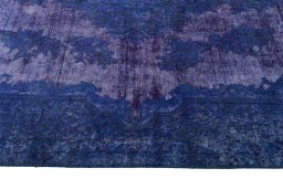 Corner detail of 1970s Kerman rug showing border pattern and Wool pile