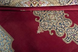 Close-up detail of 2000s Kerman rug from Iran / Persia showing Wool weave