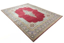 Close-up detail of 2000s Kerman rug from Iran / Persia showing Wool weave