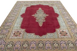 Surface texture of 2000s Kerman rug with natural Wool and intricate pattern