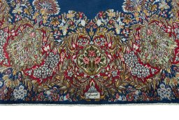 Full view of 1970s Kerman rug from Iran / Persia, 440 × 300 cm in Blue tones