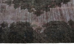 Corner detail of 1950s Kerman rug showing border pattern and Wool pile